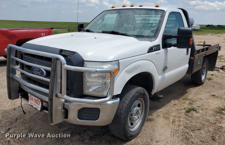 image for item JM9649 2015 Ford F350 Super Duty  bale bed pickup truck