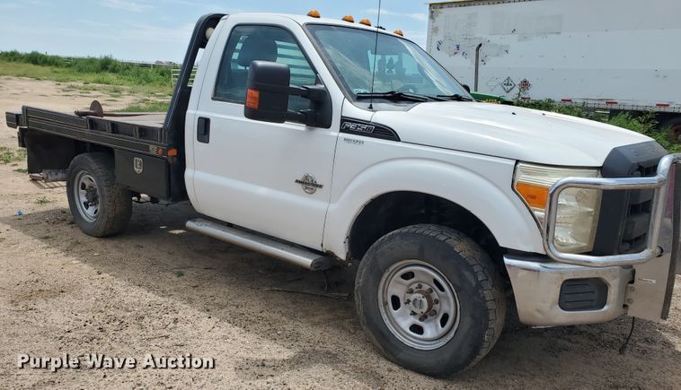 image for item JM9649 2015 Ford F350 Super Duty  bale bed pickup truck