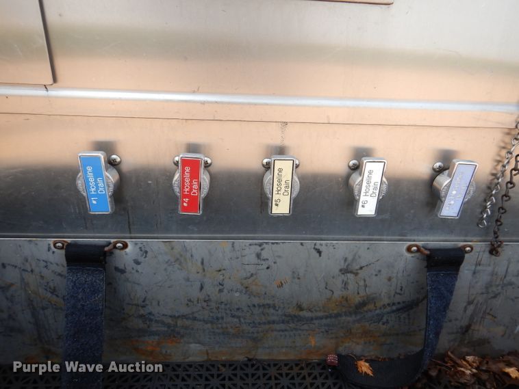 image for item IN9819 2004 Spartan 60DDEC  quint ladder fire truck