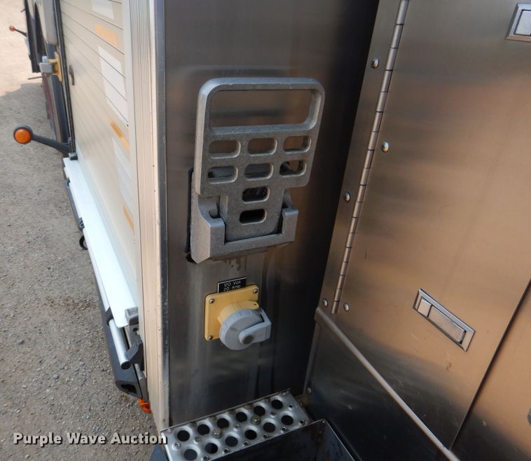 image for item IN9819 2004 Spartan 60DDEC  quint ladder fire truck