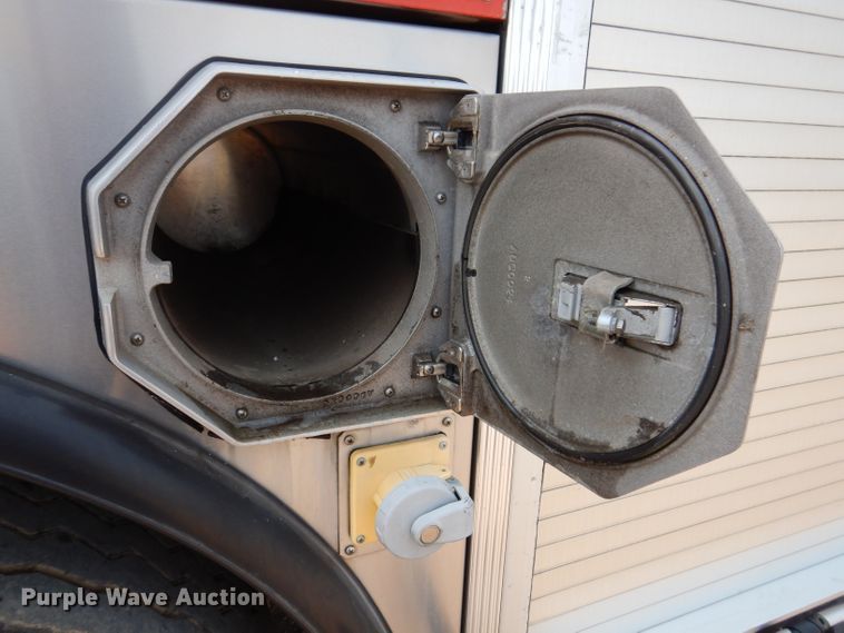 image for item IN9819 2004 Spartan 60DDEC  quint ladder fire truck