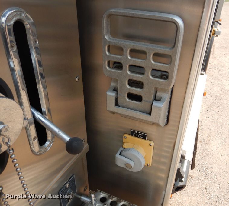 image for item IN9819 2004 Spartan 60DDEC  quint ladder fire truck