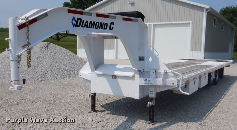 image for item DL0102 2019 Diamond C  tilt deck equipment trailer
