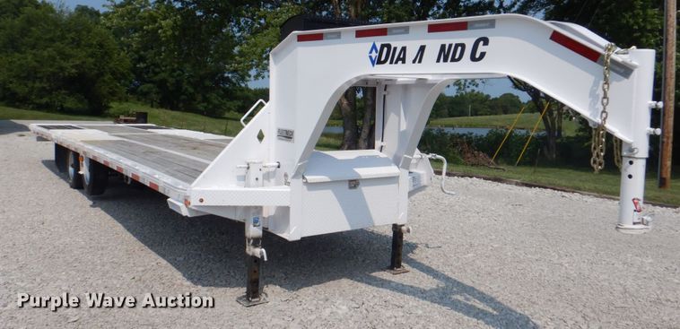 image for item DL0102 2019 Diamond C  tilt deck equipment trailer