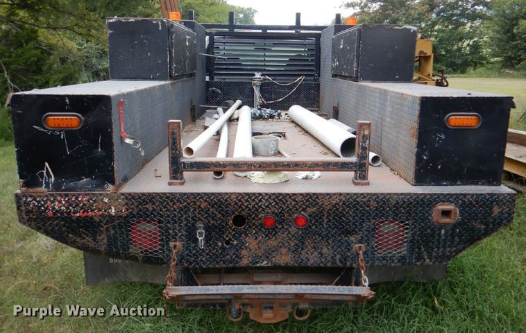 image for item IR9023 2006 Ford F550 Super Duty XL  flatbed truck