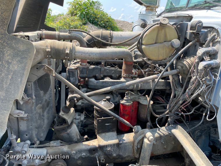 image for item KK9619 1999 Mack RD6  roll-off container truck