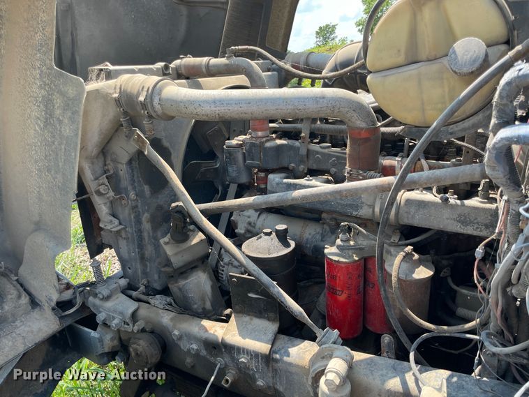 image for item KK9619 1999 Mack RD6  roll-off container truck