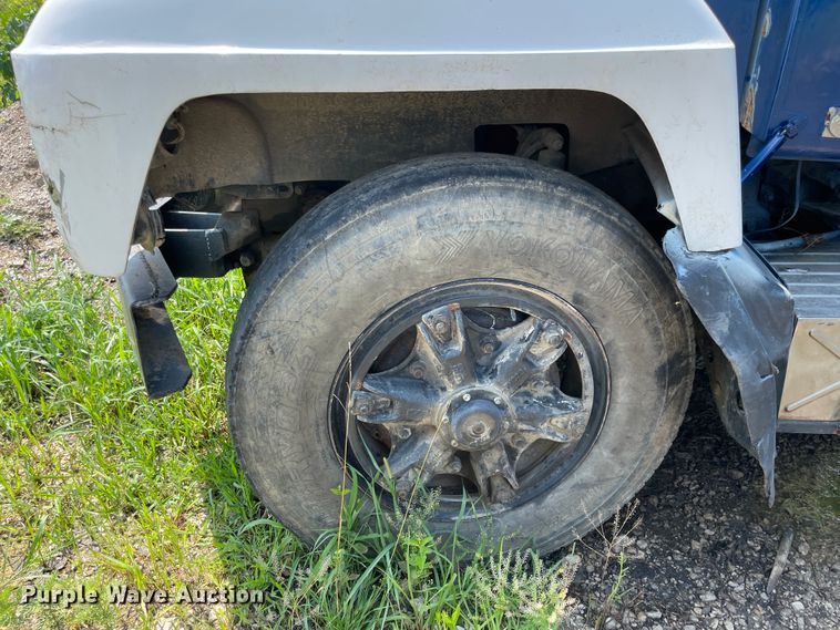 image for item KK9619 1999 Mack RD6  roll-off container truck