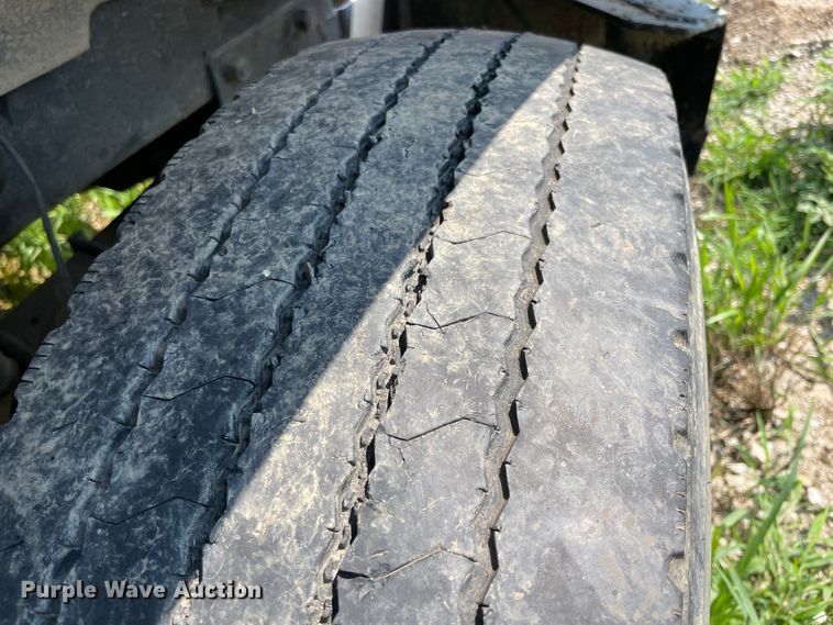 image for item KK9619 1999 Mack RD6  roll-off container truck