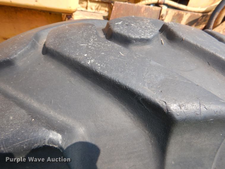 image for item DL0531 Allis-Chalmers M100 Series B  rigid frame motor grader