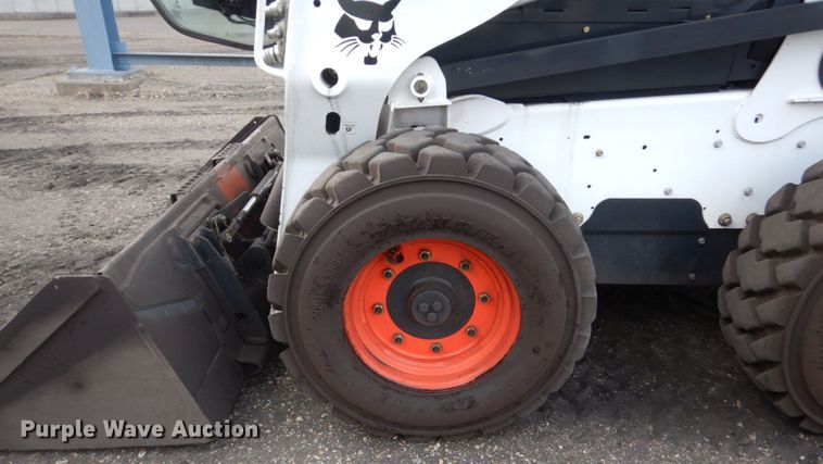 image for item HI9916 2013 Bobcat S750  skid steer loader
