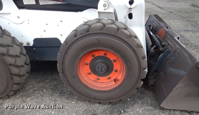 image for item HI9916 2013 Bobcat S750  skid steer loader