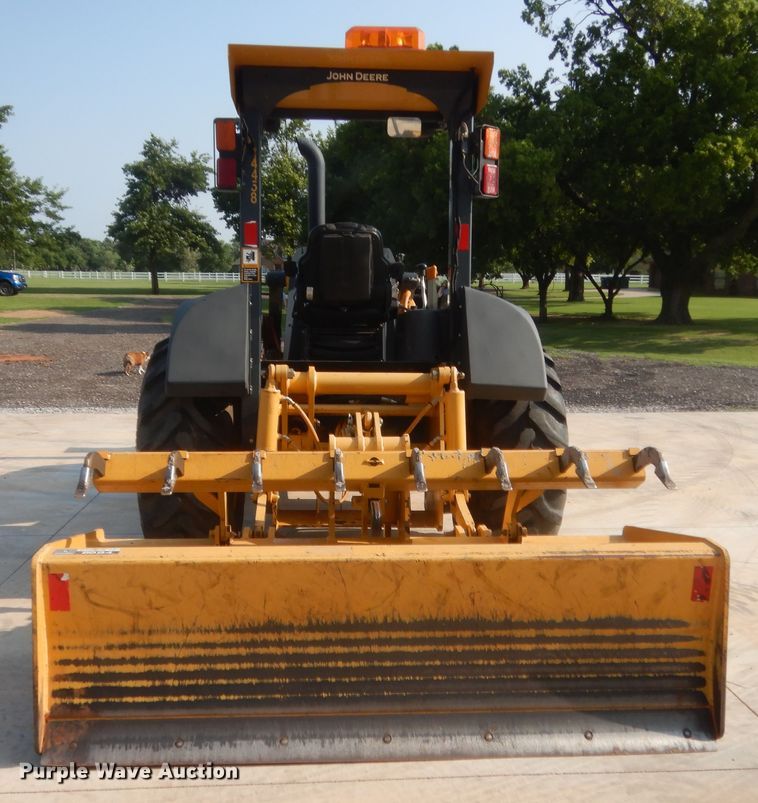 image for item IN9497 2014 John Deere 210K  landscape tractor
