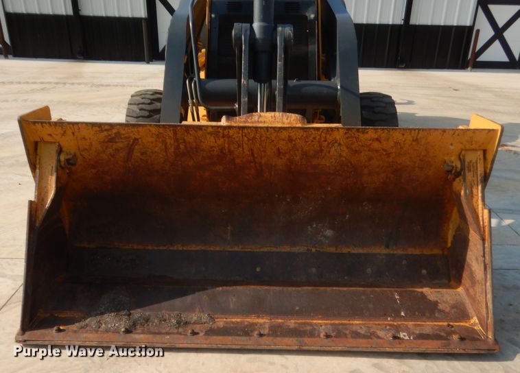 image for item IN9497 2014 John Deere 210K  landscape tractor