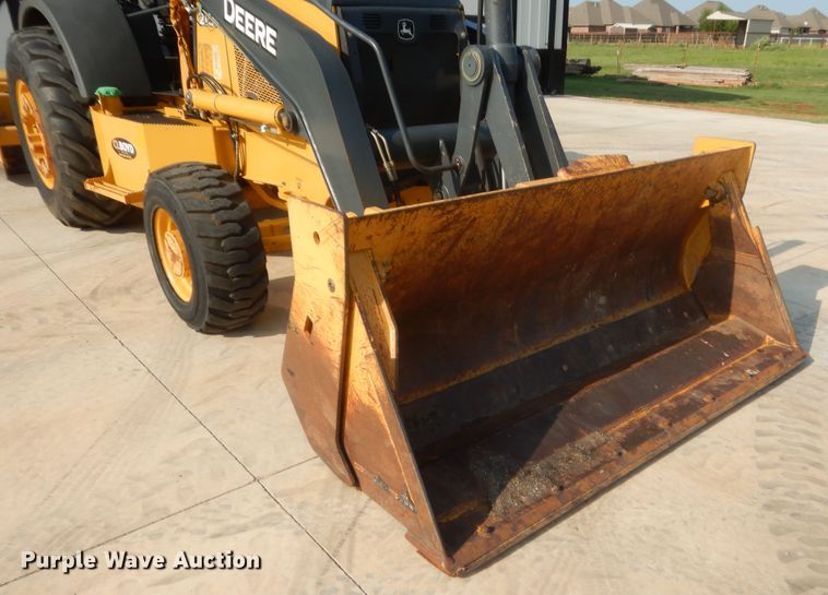 image for item IN9497 2014 John Deere 210K  landscape tractor