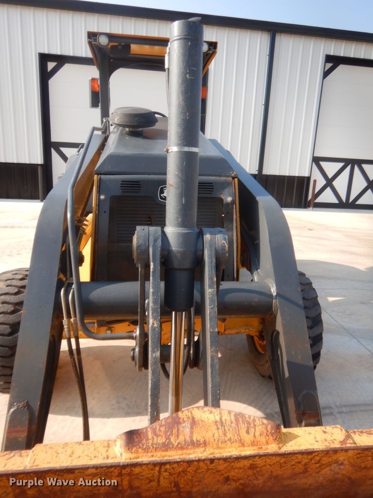 image for item IN9497 2014 John Deere 210K  landscape tractor