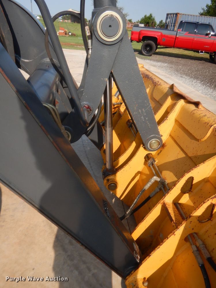 image for item IN9497 2014 John Deere 210K  landscape tractor