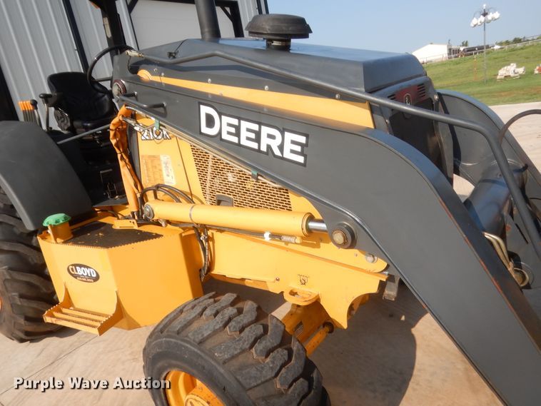 image for item IN9497 2014 John Deere 210K  landscape tractor