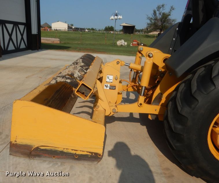 image for item IN9497 2014 John Deere 210K  landscape tractor