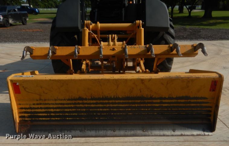 image for item IN9497 2014 John Deere 210K  landscape tractor