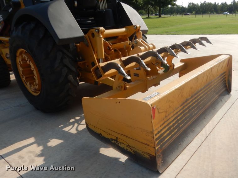 image for item IN9497 2014 John Deere 210K  landscape tractor