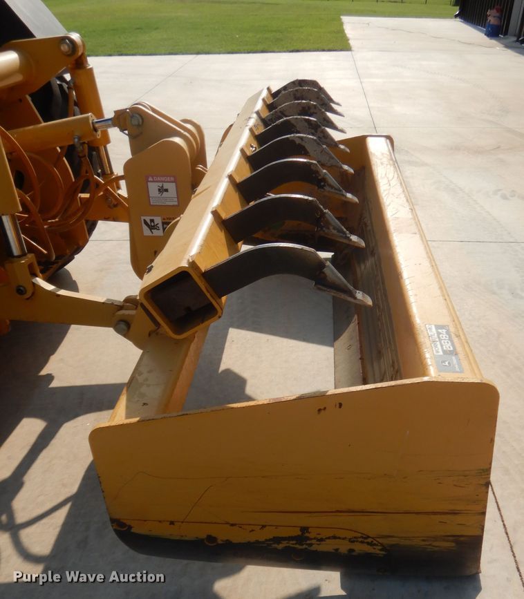 image for item IN9497 2014 John Deere 210K  landscape tractor