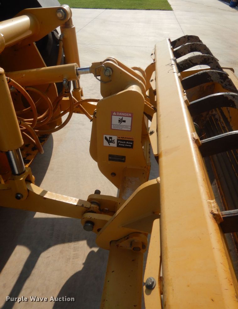 image for item IN9497 2014 John Deere 210K  landscape tractor