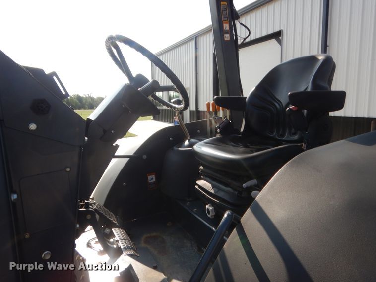 image for item IN9497 2014 John Deere 210K  landscape tractor