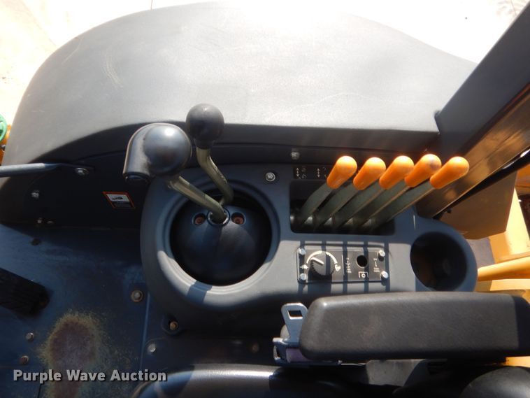 image for item IN9497 2014 John Deere 210K  landscape tractor