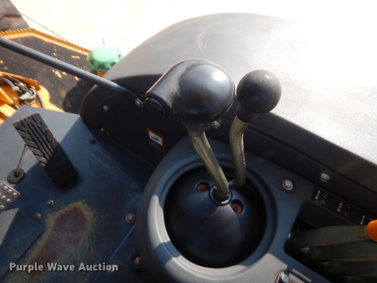 image for item IN9497 2014 John Deere 210K  landscape tractor