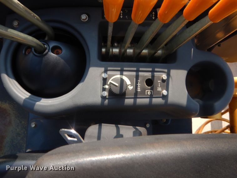 image for item IN9497 2014 John Deere 210K  landscape tractor