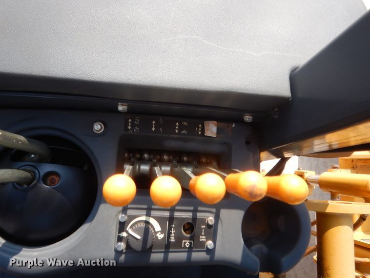 image for item IN9497 2014 John Deere 210K  landscape tractor