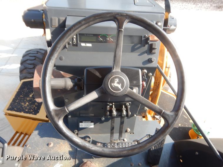 image for item IN9497 2014 John Deere 210K  landscape tractor