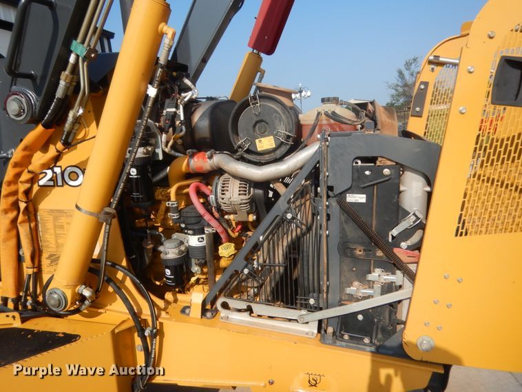 image for item IN9497 2014 John Deere 210K  landscape tractor