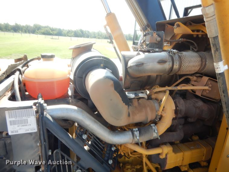 image for item IN9497 2014 John Deere 210K  landscape tractor