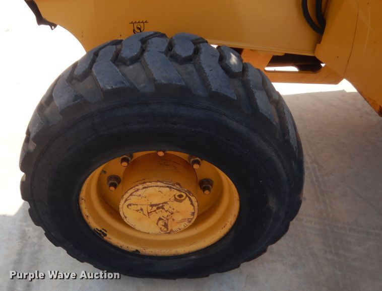 image for item IN9497 2014 John Deere 210K  landscape tractor