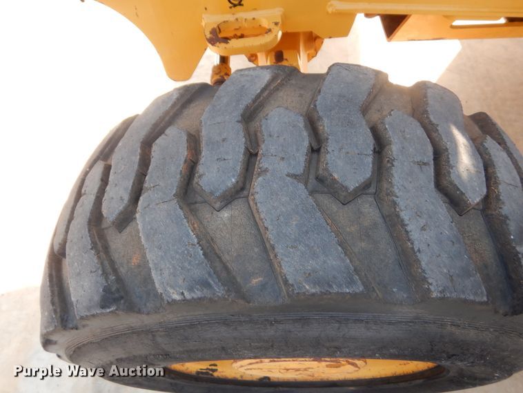 image for item IN9497 2014 John Deere 210K  landscape tractor