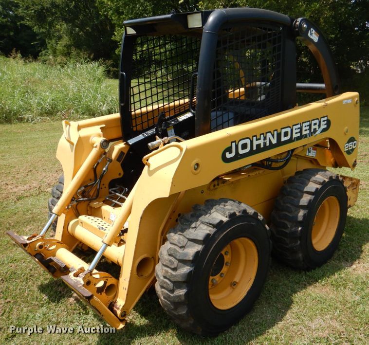 image for item IR9004 1999 John Deere 250  skid steer loader