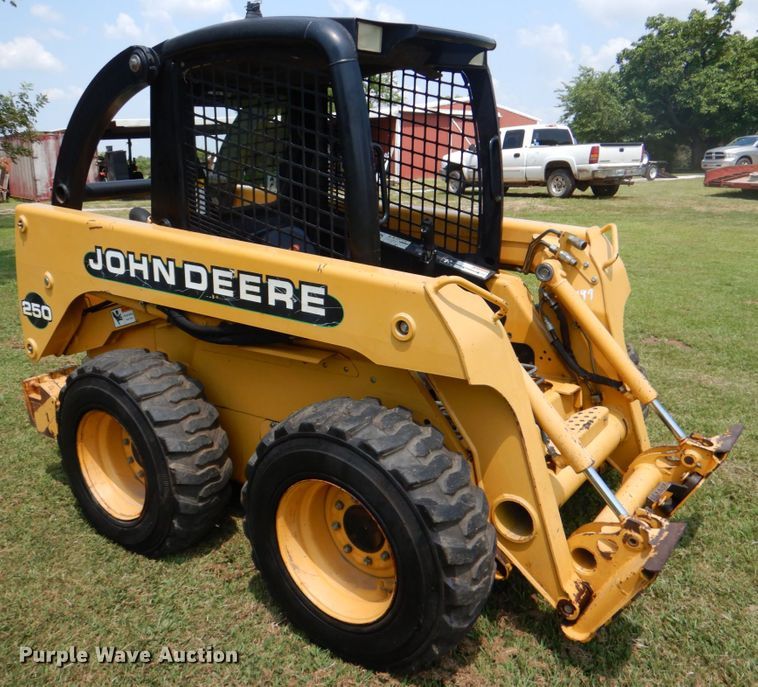 image for item IR9004 1999 John Deere 250  skid steer loader