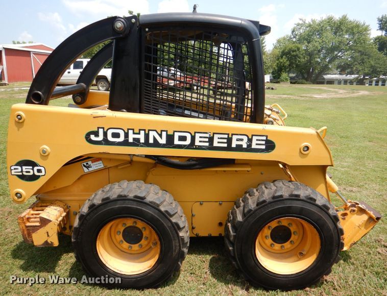 image for item IR9004 1999 John Deere 250  skid steer loader