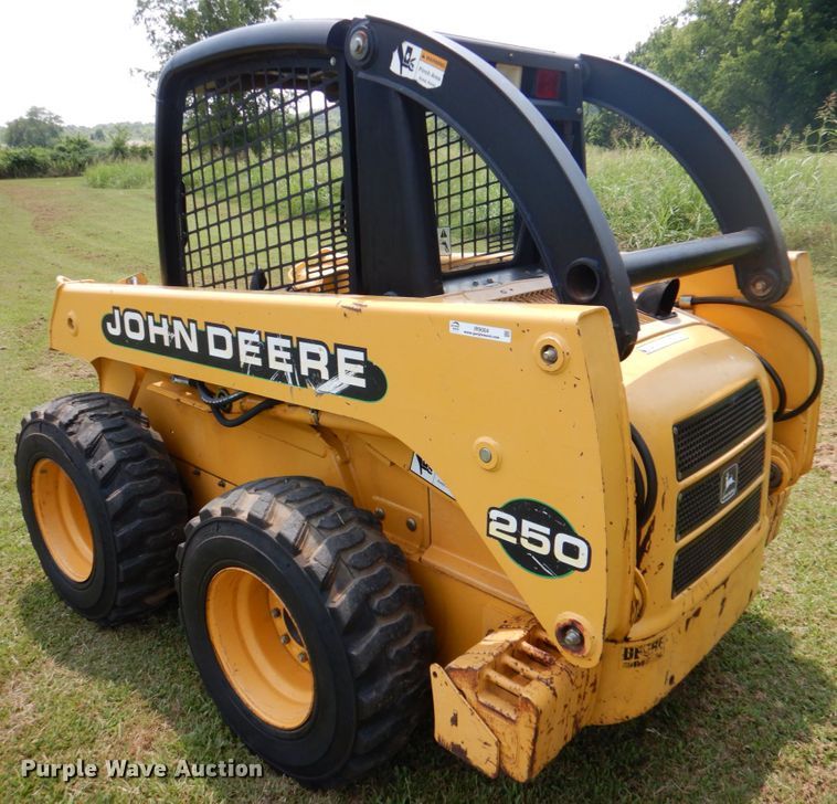 image for item IR9004 1999 John Deere 250  skid steer loader