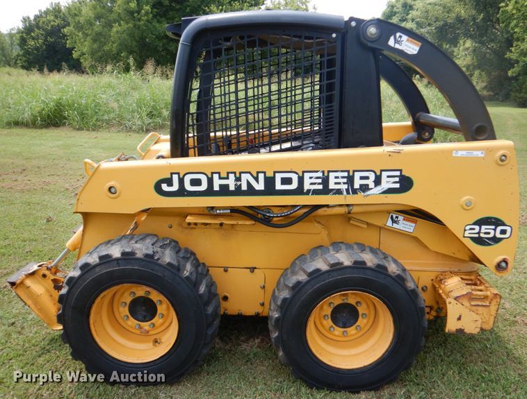 image for item IR9004 1999 John Deere 250  skid steer loader