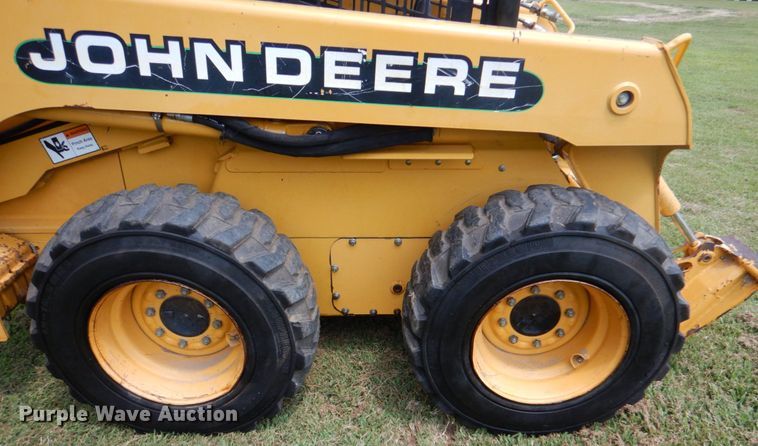 image for item IR9004 1999 John Deere 250  skid steer loader