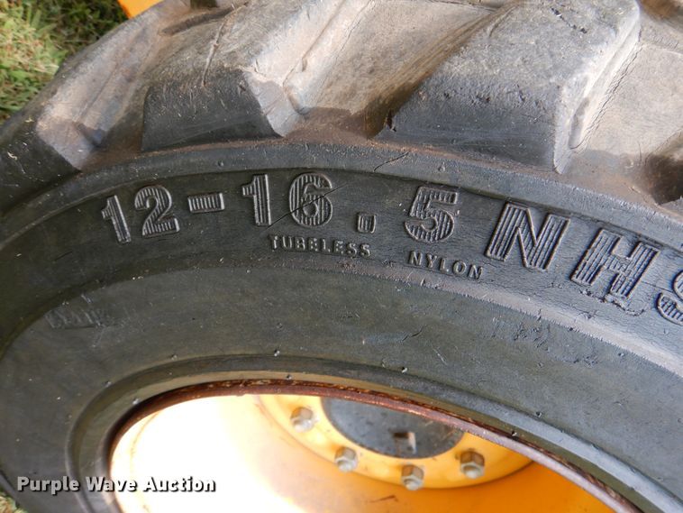 image for item IR9004 1999 John Deere 250  skid steer loader