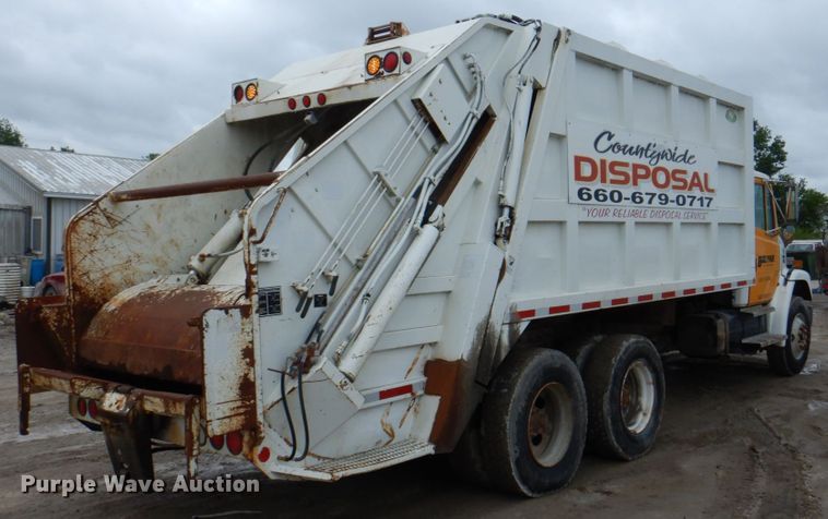 image for item JY9960 1999 Freightliner FL80  refuse truck