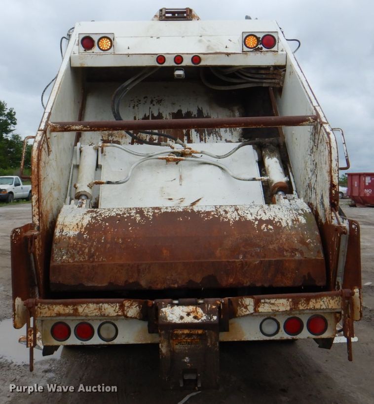 image for item JY9960 1999 Freightliner FL80  refuse truck