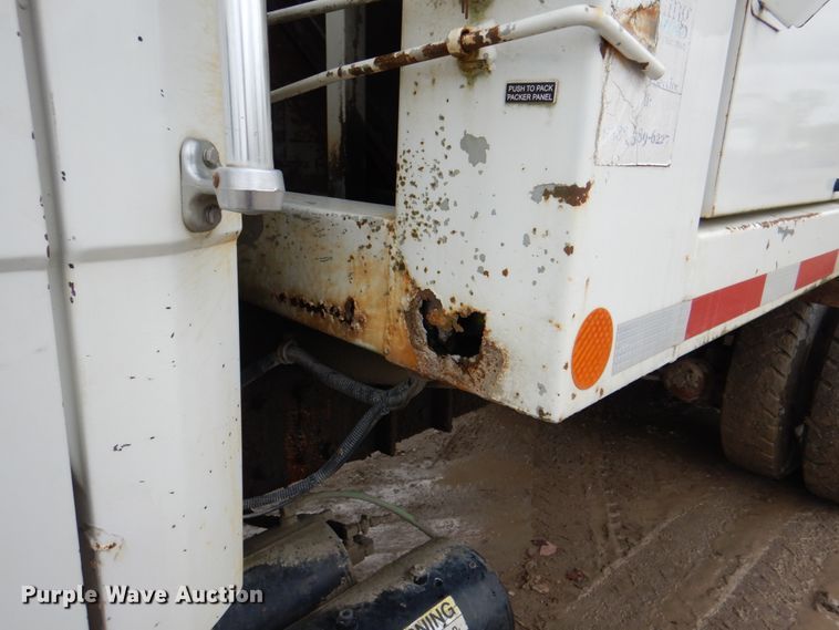 image for item JY9960 1999 Freightliner FL80  refuse truck