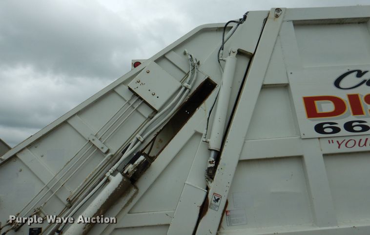 image for item JY9960 1999 Freightliner FL80  refuse truck