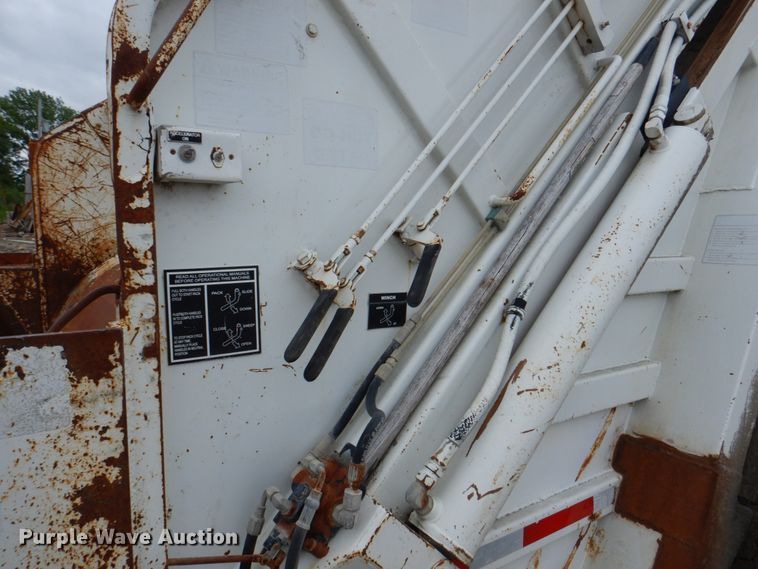 image for item JY9960 1999 Freightliner FL80  refuse truck