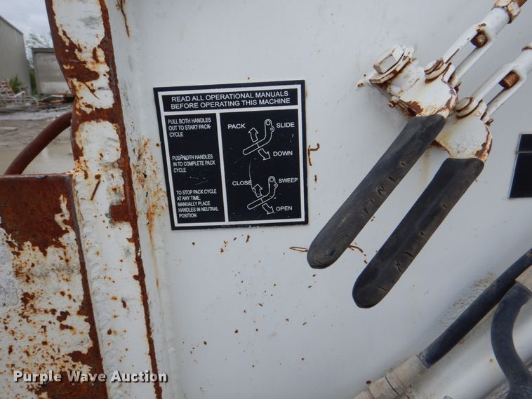 image for item JY9960 1999 Freightliner FL80  refuse truck